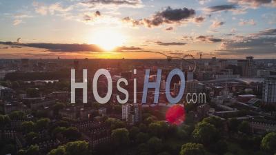 Establishing Aerial View Shot Of London Uk, United Kingdom, Palace Of Westminster, Parliament, Big Ben, Sun Setting Amazingly - Video Drone Footage