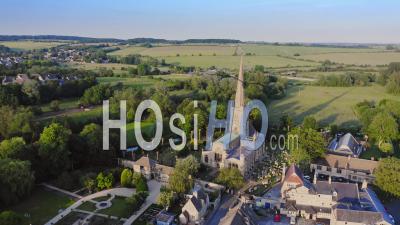 Aerial Drone View Of Cotswolds Village And Burford Church In England, A Popular English Picturesque Tourist Destination In The Countryside Of Gloucestershire