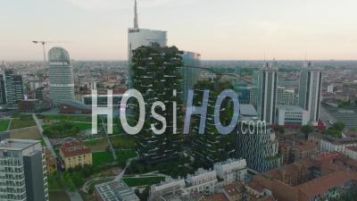 Pair Of Green Houses Covered With Vegetation. Modern Multistorey Apartment Houses In Urban Borough. Milano, Italy - Video Drone Footage