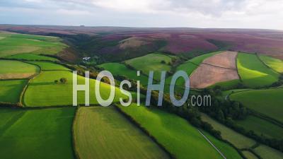 United Kingdom, Devon, Exmoor National Park, Aerial View Over The Moors And Farmland - Video Drone Footage