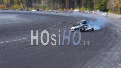 Race Car Drifting On Speed Track. View From Above - Video Drone Footage