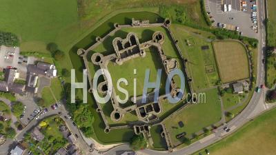 Aerial View Of Beaumaris Castle, Beaumaris, Anglesey, Gwynedd, Wales - Video Drone Footage