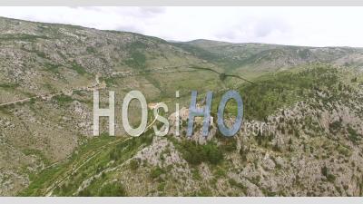 An Aerial View Shows Karst Hill In Mostar, Bosnia, Which Houses The Blagaj Fortress - Video Drone Footage