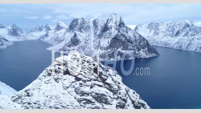 Snow-Covered Mountains Are Seen In The Lofoten Islands, Norway - Video Drone Footage