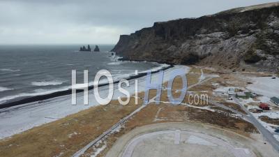 An Aerial View Shows The Reynisdrangar Sea Cresting On Vik, Iceland - Video Drone Footage