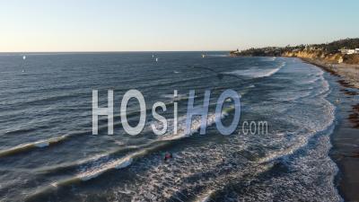 Aerial Of Kite Surfing And Kite Surfers On Pacific Beach, San Diego, California - Video Drone Footage