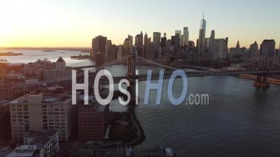 2020 - Beautiful Aerial Over Lower Manhattan New York, Brooklyn Bridge, Manhattan Bridge And East River - Video Drone Footage