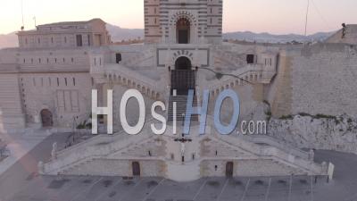 Basilica Of Notre-Dame-De-La-Garde At Sunrise, Marseille, Bouches-Du-Rhone, France - Video Drone Footage
