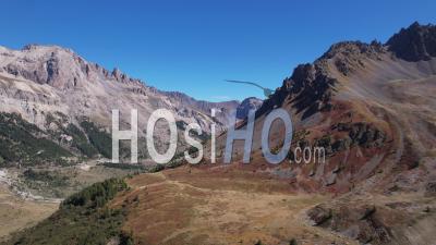 Mountain Landscape In Autumn From Col Du Lautaret (guisane Side, Serre Chevalier), Hautes-Alpes, France, Viewed From Drone