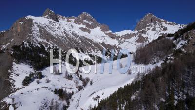 Mountains Around The Mountain Pasture Of Alpe Du Lauzet (guisane Valley), Briançonnais, In Winter, Hautes-Alpes, France, Viewed From Drone