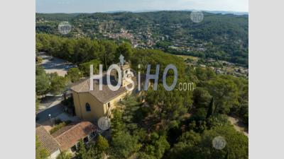 Notre-Dame-Des-Graces Church In Cotignac Village, Provence, France - Aerial Photography