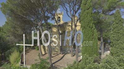 Notre-Dame-Des-Graces Church In Cotignac Village, Provence, France - Video Drone Footage