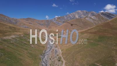 Valley Of The Gâ Torrent, At The Foot Of The Pic Du Mas De La Grave, Hautes-Alpes, France, Viewed From Drone