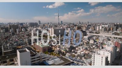 Aerial Of Residential Area With Tokyo Skytree In The Background - Video Drone Footage