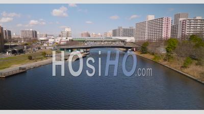 River Aerial Over Bridges In Japan - Video Drone Footage