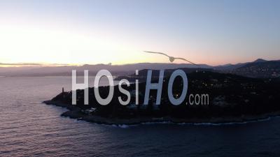 Lighthouse Of Saint-Jean-Cap-Ferrat And Bay Of Nice At Dusk, Drone Aerial Footage