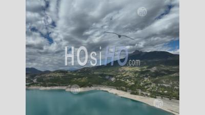 The Serre-Poncon Lake And The Savines-Le-Lac Bridge, Hautes-Alpes, France - Aerial Photography