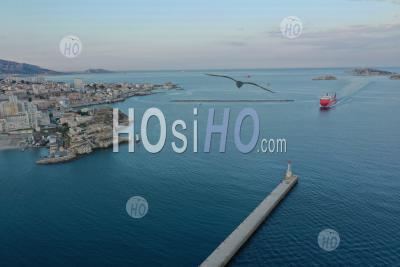Marseille, Euromediterranean Area, Seawall, Arrival Of A Cargo Ship Corsica Ferry In The Large Maritime Port Of Marseille From Sainte Marie Lighthouse, Bouches-Du-Rhone, France - Aerial Photography