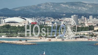 Overview Of Marseille From The Sea,Ferris Wheel Of Prado And Velodrome Stadium In The Background, Bouches-Du-Rhone, France - Video Drone Footage