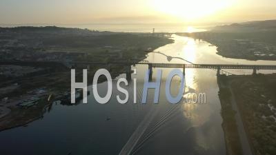 Martigues, Caronte Channel, Caronte Viaduct And Its Swing Bridge At Sunrise, Bouches-Du-Rhone, France - Video Drone Footage