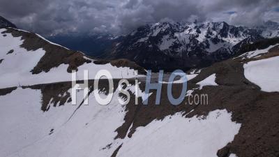 The Galibier Pass In The Spring Before The Snow Melts, Viewed From Drone