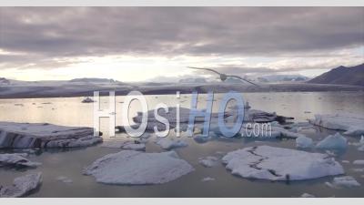 Sunset Over Jokulsarlon Glacier Lagoon 03 - Bertrand Sinssaine - Video Drone Footage