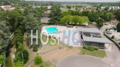Public Swimming Pool In The Town Of Beaurepaire Isere, French - Video Drone Footage
