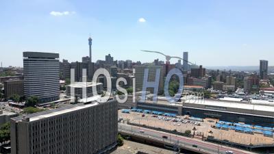 Park Station And Hillbrow In The Background In Johannesburg South Africa - Video Drone Footage