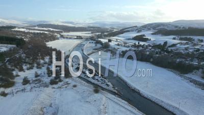 Findhorn River In The Shade And Sunshine During Winter In The Scottish Highlands - Video Drone Footage