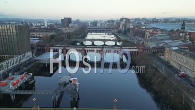 Bridges Over The River Clyde At Dawn In Winter With The Glasgow City Centre In The Background - Video Drone Footage