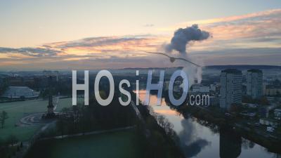 Strathclyde Distillery On The River Clyde At Dawn In Winter With Glasgow Green And The East End In The Background - Video Drone Footage
