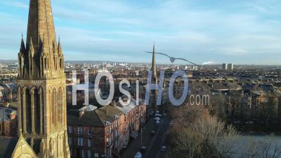 Queens Park Baptist Church During A Winter Morning With Tenement Housing In The Background - Video Drone Footage
