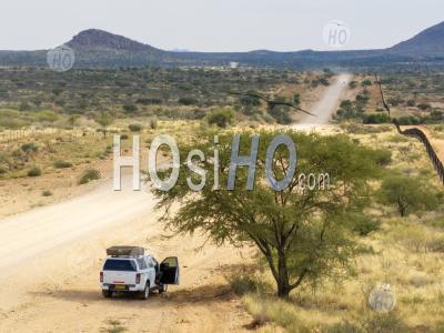 Four-Wheel Drive 4wd Car Parked On Desert Road C24 Nearby Rehoboth, Namibia - Aerial Photography