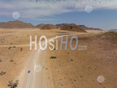 Four-Wheel Drive 4wd Car On Desert Road D1273 Nearby Solitaire, Namibia - Aerial Photography