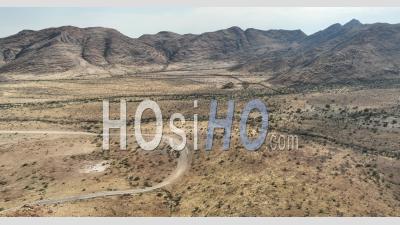 Aerial View Of The Desert Road D1275 At Spreetshoogte Pass, Namibia - Video Drone Footage