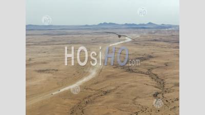 Four-Wheels Drive On C35 Desert Track Around The Brandberg Mountain, Nearby Uis City, Namibia - Aerial Photography