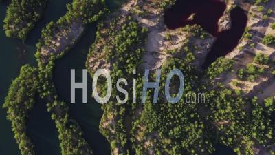 Lake With Red Polluted Toxic Water In Abandoned Open Pit Mine. - Video Drone Footage