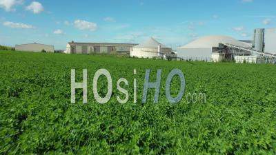 Biogas Plant In Agricultural Plains, France, Drone Point Of View