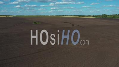 Aerial View Of A Plowed Field Ready For Sowing. - Video Drone Footage