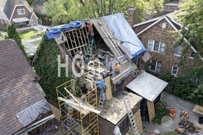 Workers Rebuild House Hit By Falling Tree - Aerial Photography
