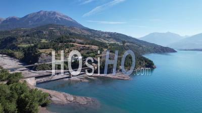 Lake Of The Serre-Ponçon Hydroelectric Dam At Its Maximum Filling Level., Viewed From Drone