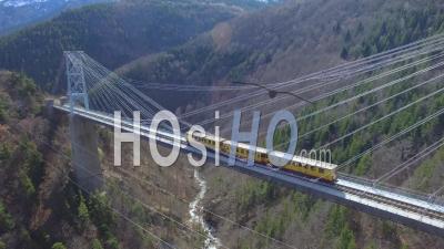 Little Yellow Train On The Gisclard Bridge - Video Drone Footage