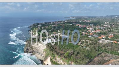Seashore And Cliffs Nearby Pura Uluwatu Temple, Bali, Indonesia - Video Drone Footage
