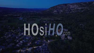 Taillades Village And Amphitheater At Dusk, France - Video Drone Footage